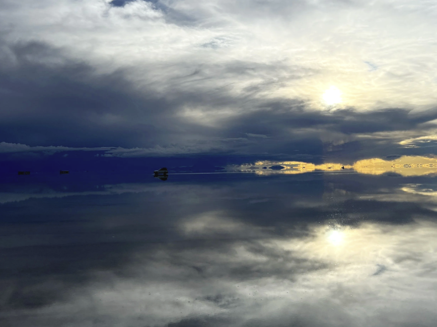 Sunset reflected on the Uyuni salt flats during the dry season