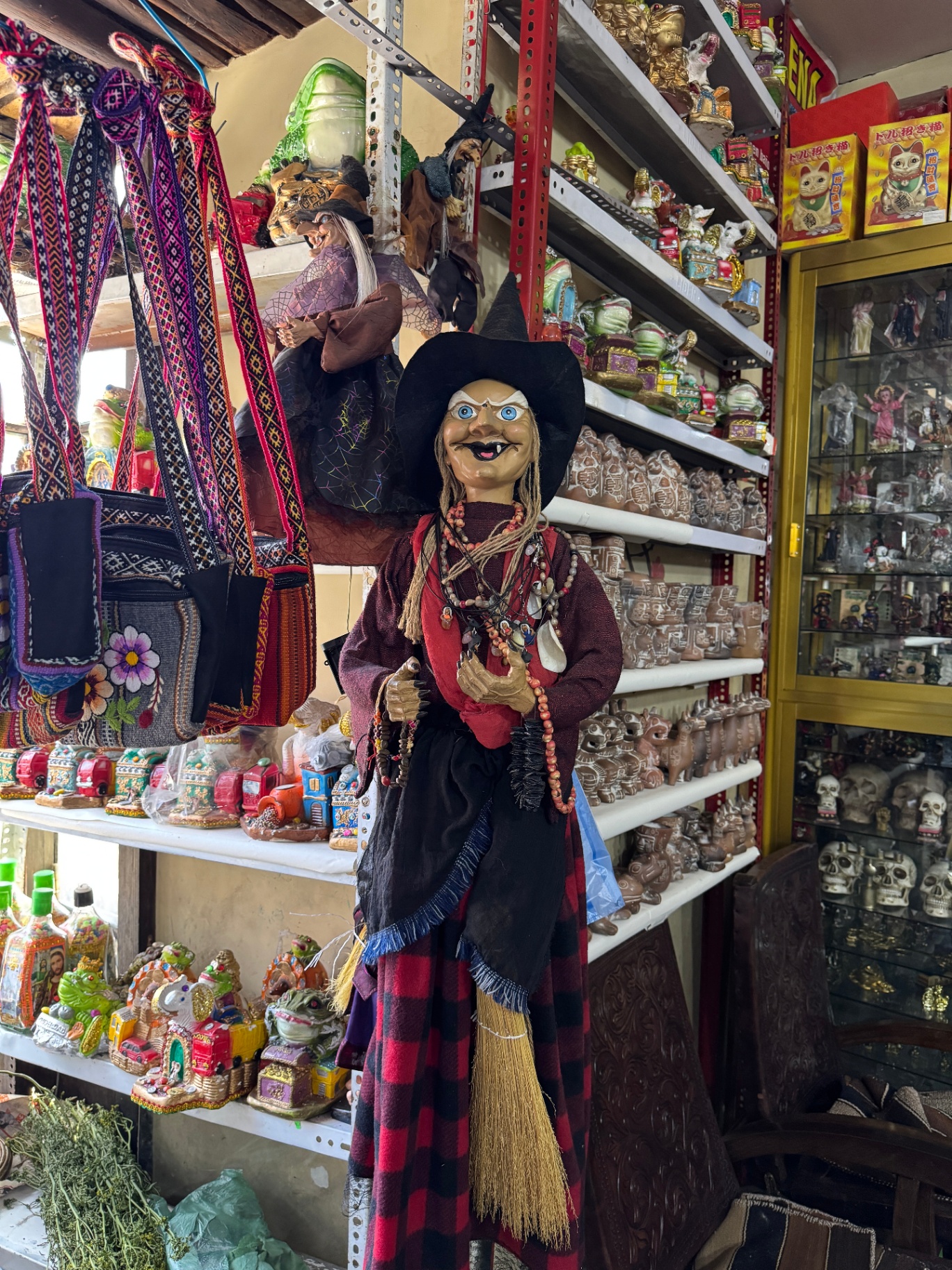 Decorative witch figures among charms and souvenirs at the Witches’ Market in La Paz