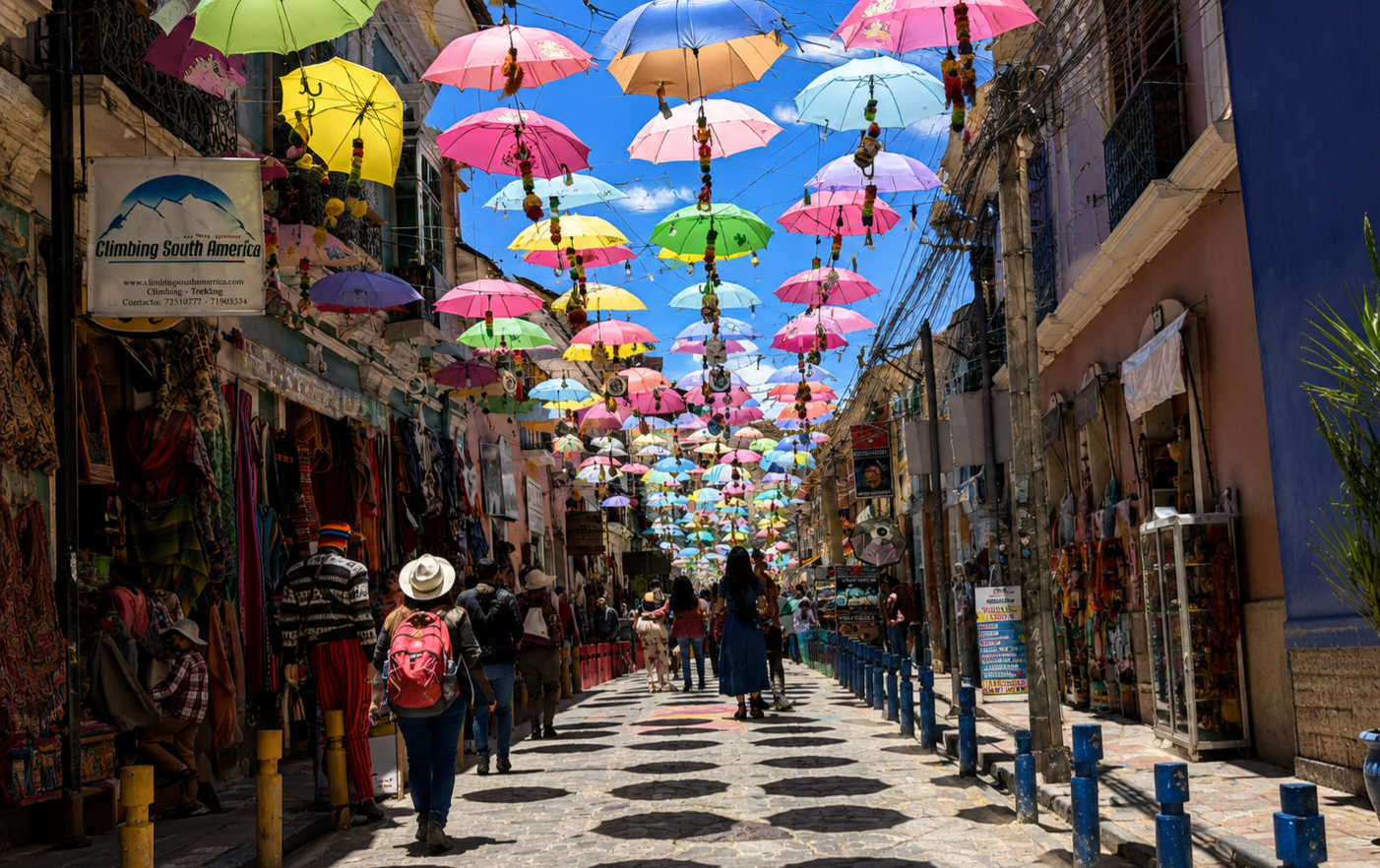 Calle Sagárnaga in La Paz with a canopy of colorful umbrellas strung above the market street