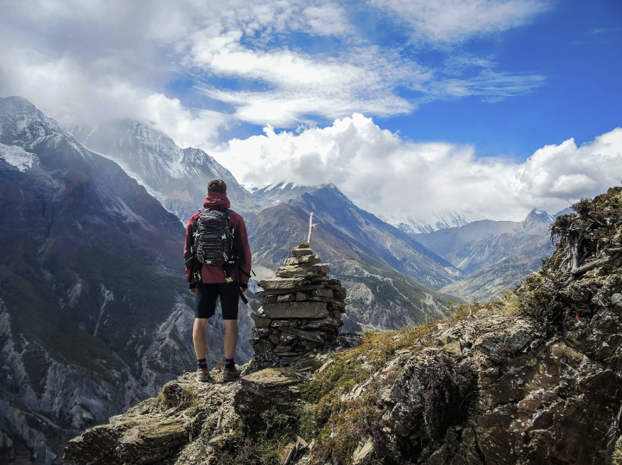Trekker looking out over the Andes on a clear winter day