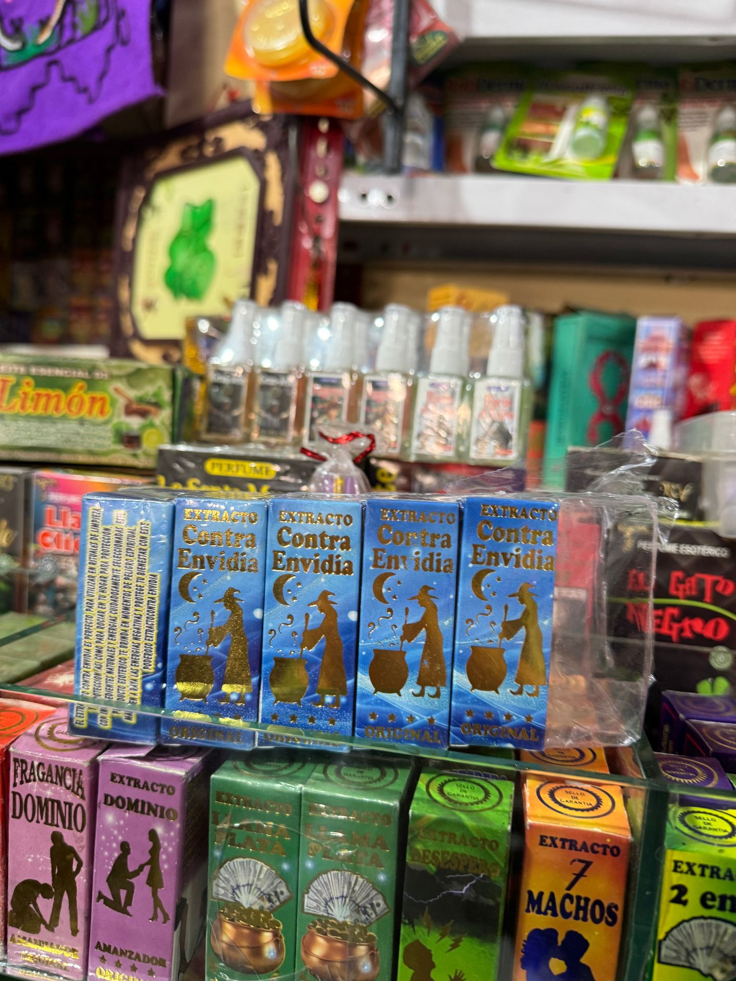 Small bottles and colourful extracts sold with wishes for luck, love and protection